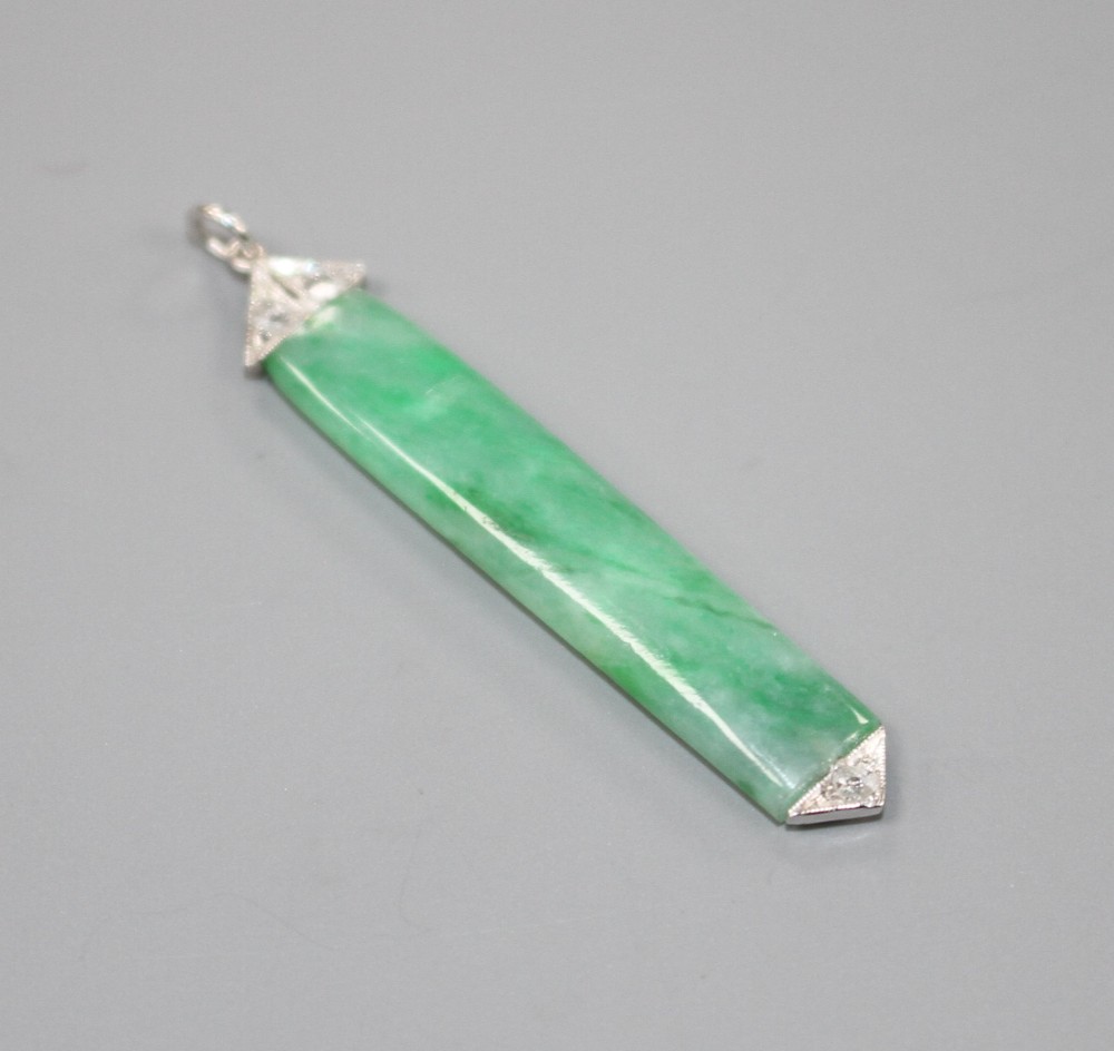 A 1920s style white metal mounted, jade and diamond pendant, overall 38mm, gross weight 1.7 grams.